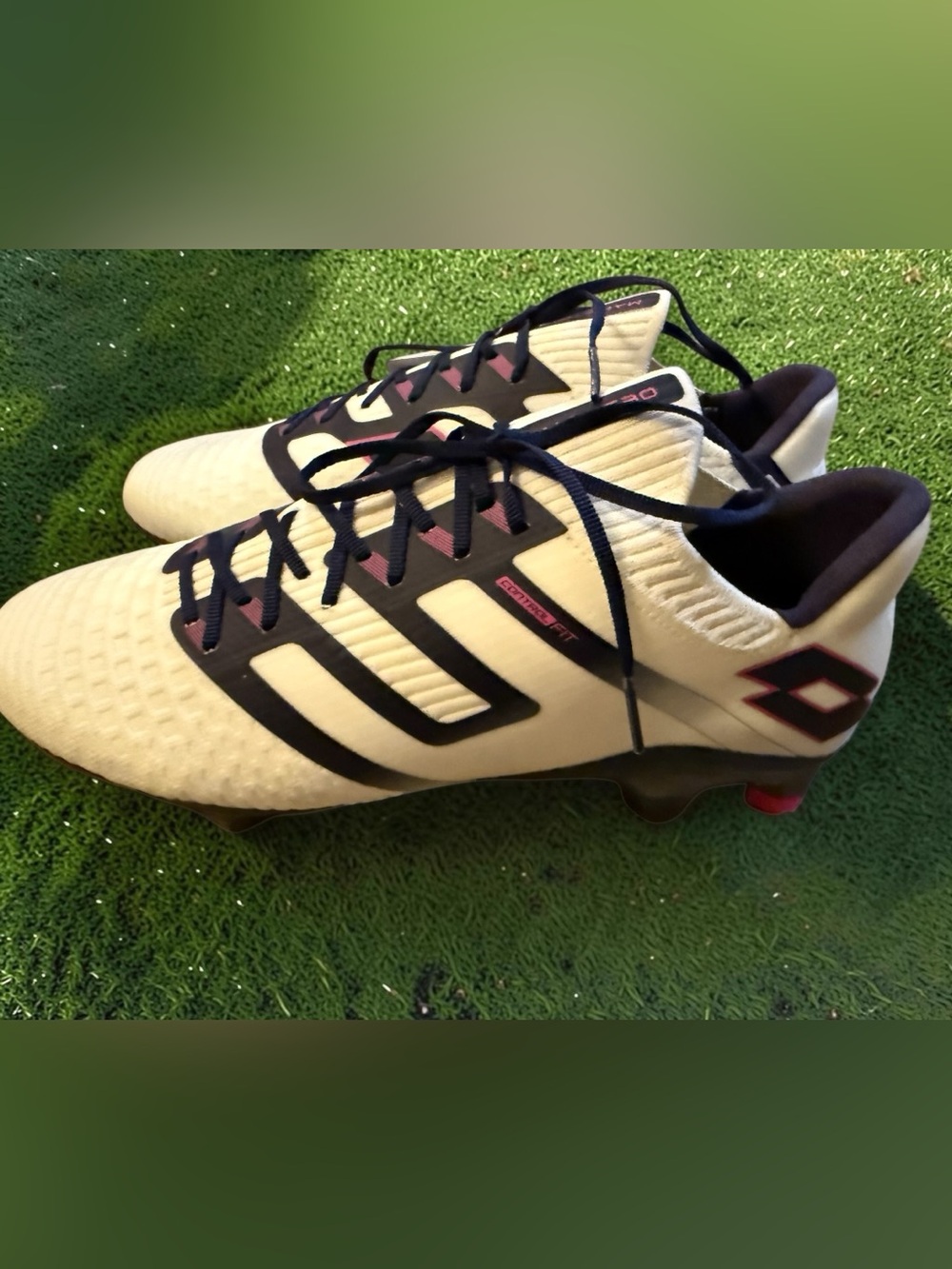 Lotto Maestro 100 IV FG soccer cleats in white with blue and pink details. -nwt